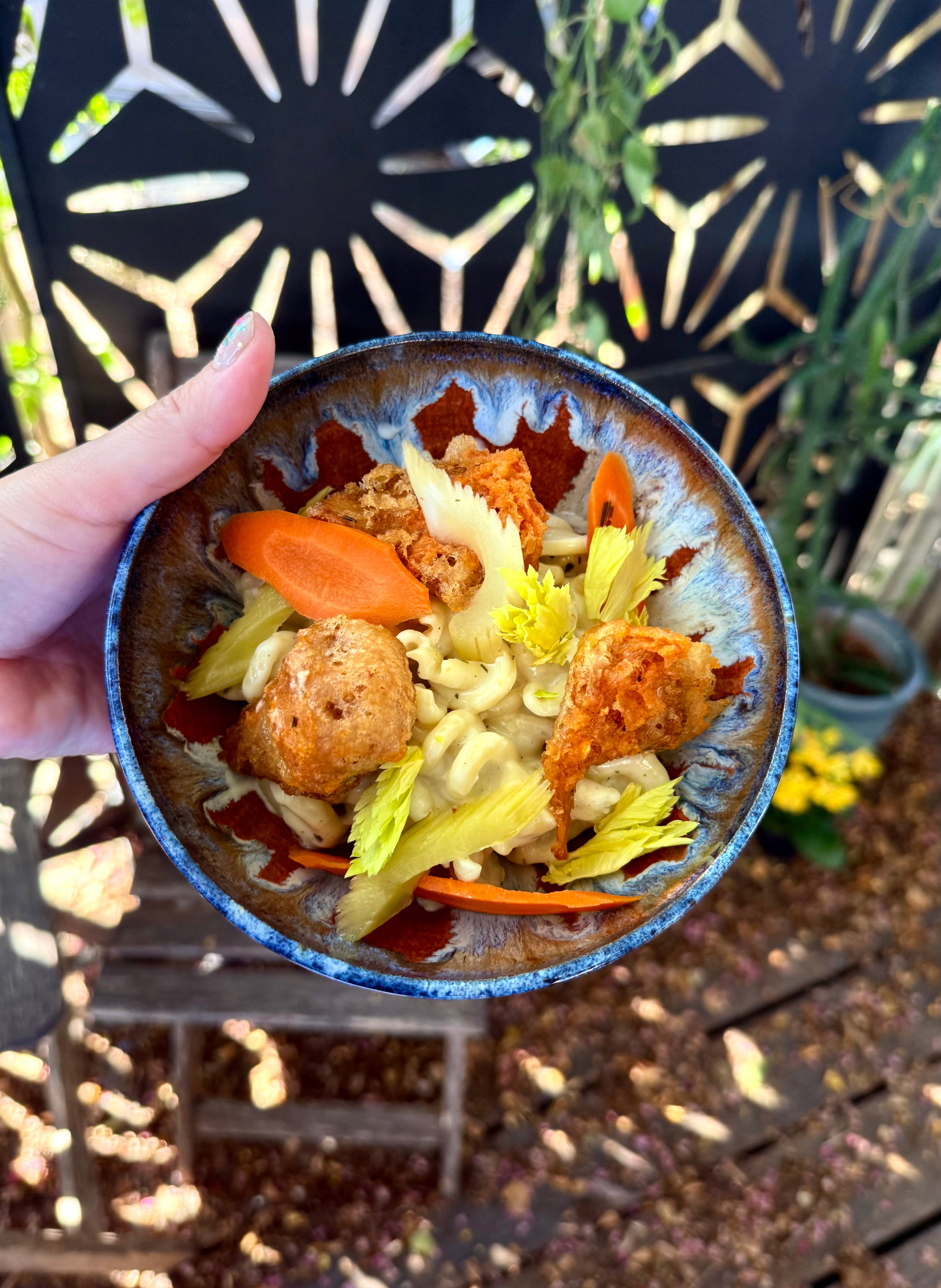Buffalo Style Fried Mushrooms with Blue Cheese Vesuvio garnished with Pickled Carrots & Celery